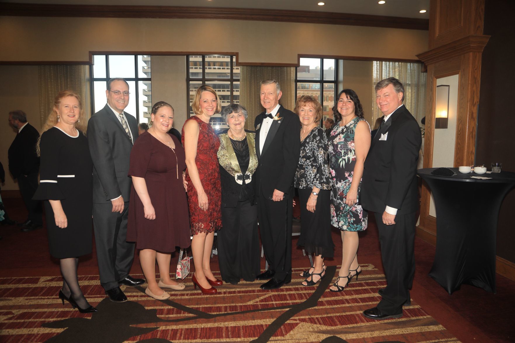 Teresa and Jeff Rickmeyer, Brittany and Kim Skrainka, Marilyn and Jay Rickmeyer, honoree, Roberta Shinners, Amy Rickmeyer Pool, John Huston